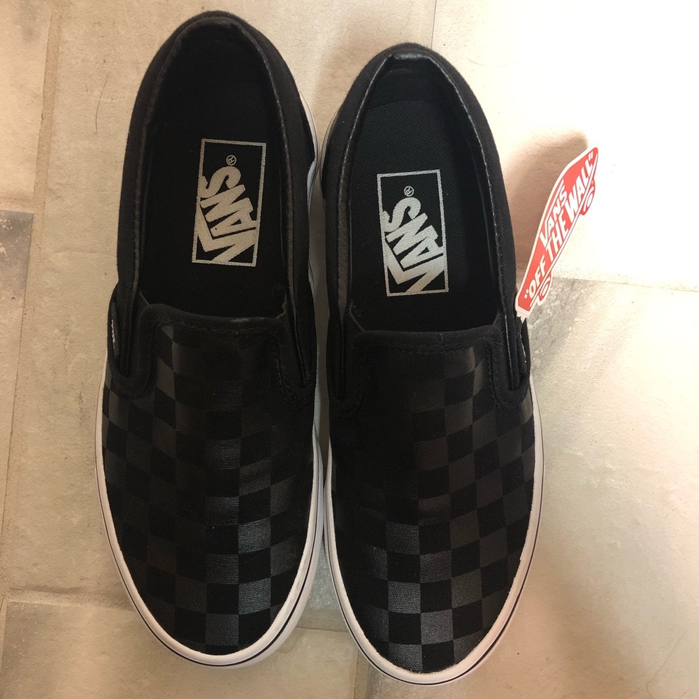Black checkerboard Vans size 5